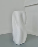 Make a statement with this stunning Macaroni Porcelain Vase - a true work of art that's perfect for showcasing your favorite delicate blooms. With its unique design and high-quality, durable ceramic material, this vase is sure to become a centerpiece in any room. Ideal for home or office décor, it's also the perfect gift for any occasion.